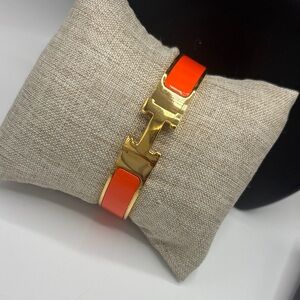 Gold Hinged Bangle Bracelet with Orange Enamel H Detail